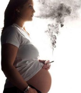 Pregnant girl smoking